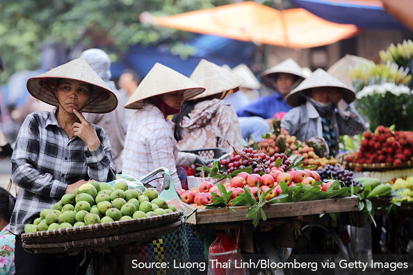 Image 6: Vietnamese peasants selling their goods at a market